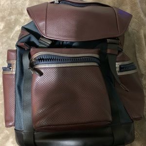 Leather and fabric coach backpack